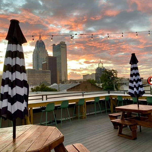 Rooftop dining area at Greer's St Louis Street in Mobile.